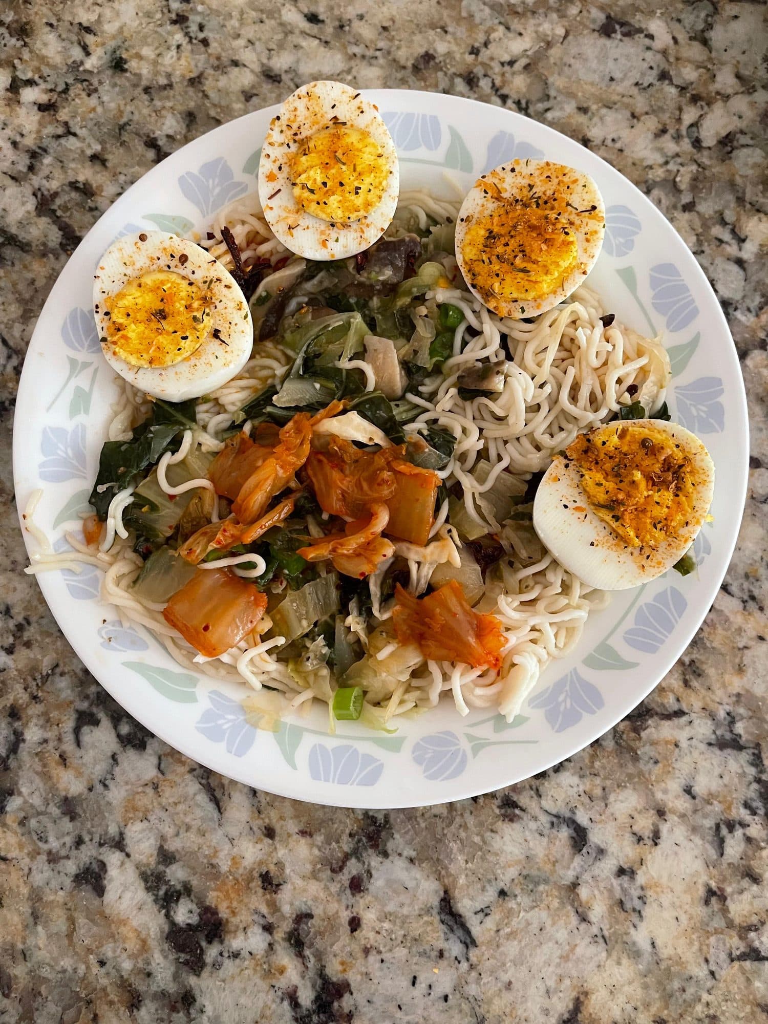 Veggie ramen bowl with soft-boiled eggs